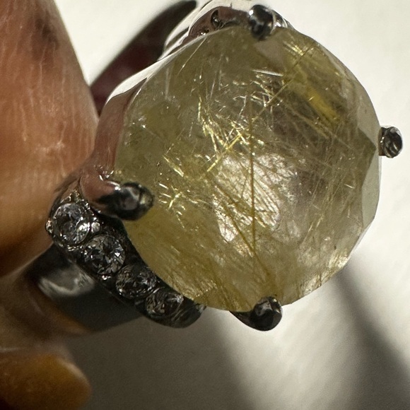Vintage 316L stainless steel ring featuring a faceted yellow gemstone